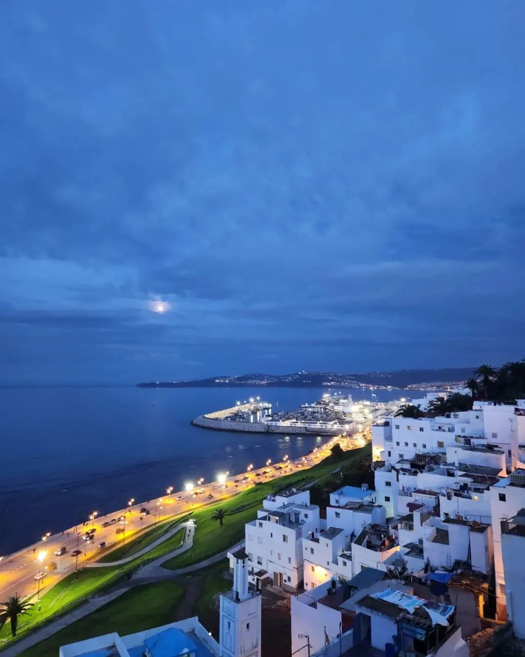 Moonrise over Tangier's bay, where the city meets the Strait of Gibraltar.